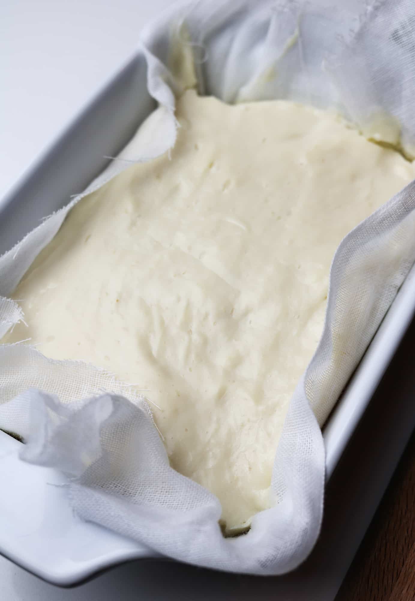 stracchino cheese in mould