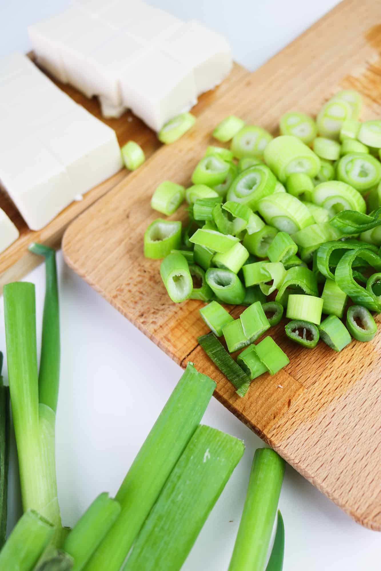 chopped spring onions and cube silken tofu