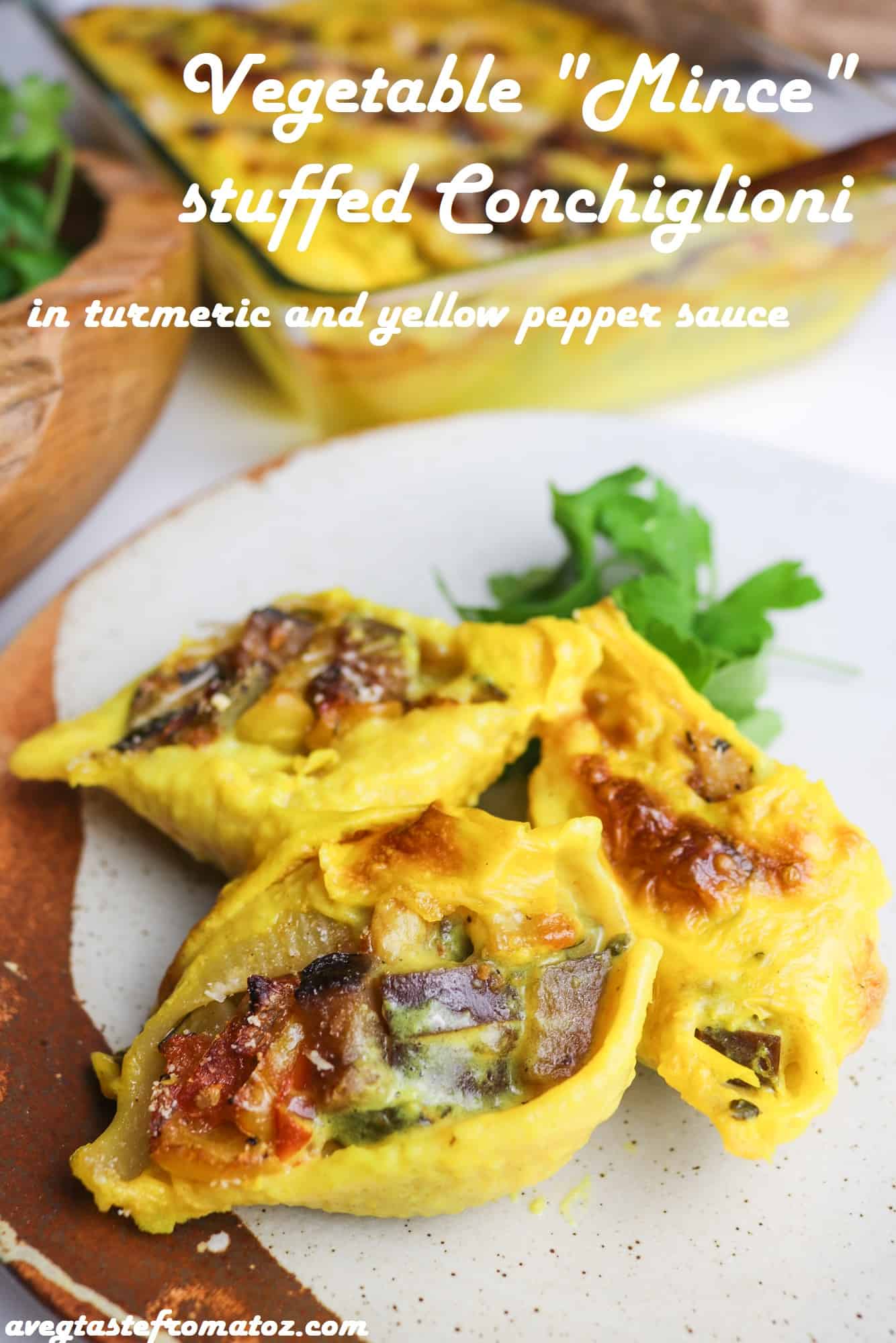 These conchiglioni pasta shells are stuffed with finely diced veggies (vegetable mince) and oven baked in a fragrant and golden pepper and turmeric yellow sauce. #vegan #easy #plantbased #wfpb #recipe #pasta #pastashells #conchiglioni #vegetablemince #veganmince #veggiemince #vegetarian #turmeric #yellow #golden #pastabake #pastainspo