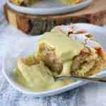 moist slice of rhubarb sponge covered in custard