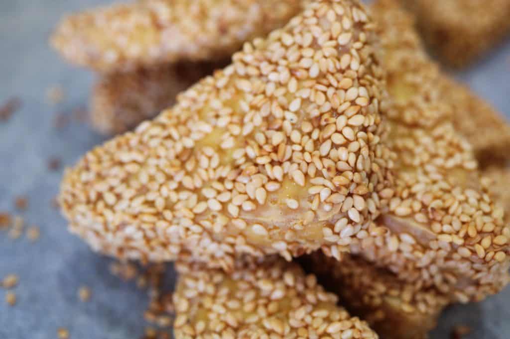 crispy tofu coated in sesame seed out of the oven
