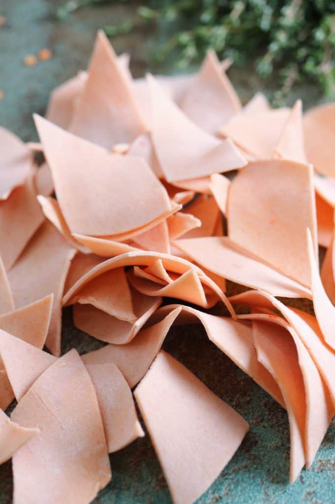 close up of red lentil pasta maltagliati