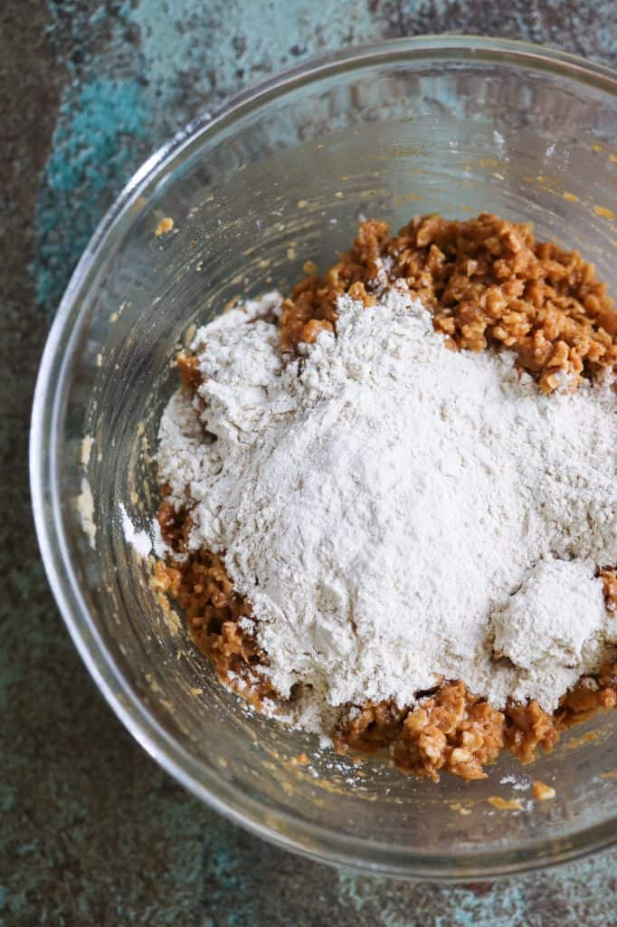 Vegan burger soy TVP and gluten mixture in a glass bowl