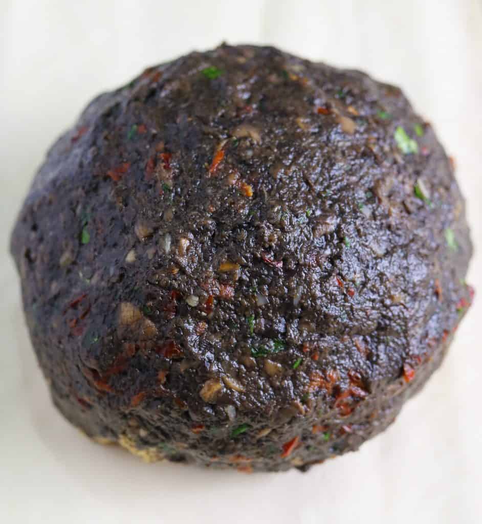 cauliflower covered in mushroom and sundried tomato paste