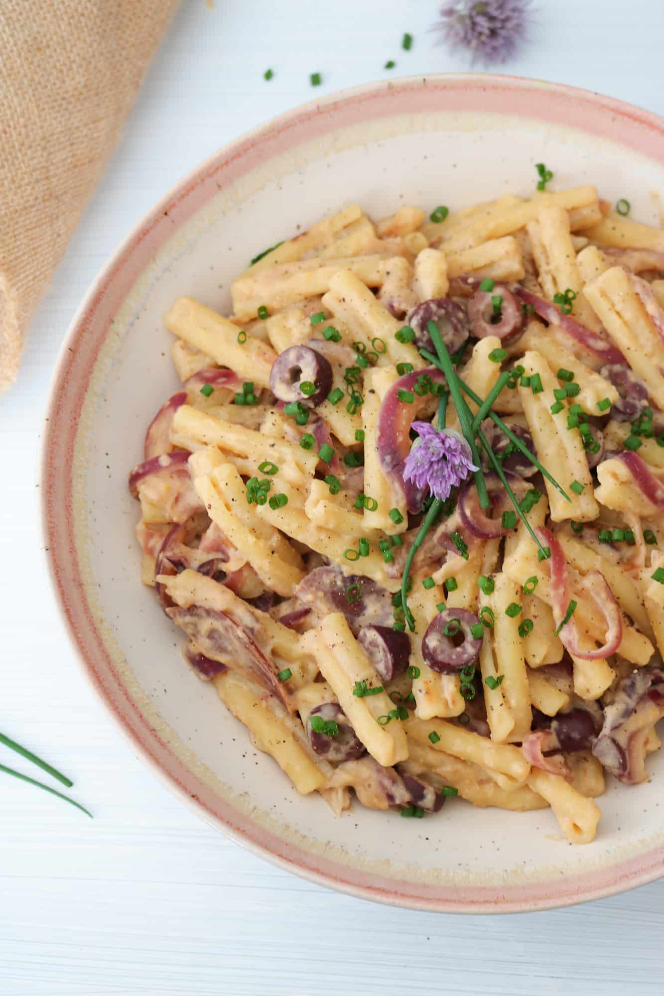 Hummus Pasta Olive and Caramelized Onion close up
