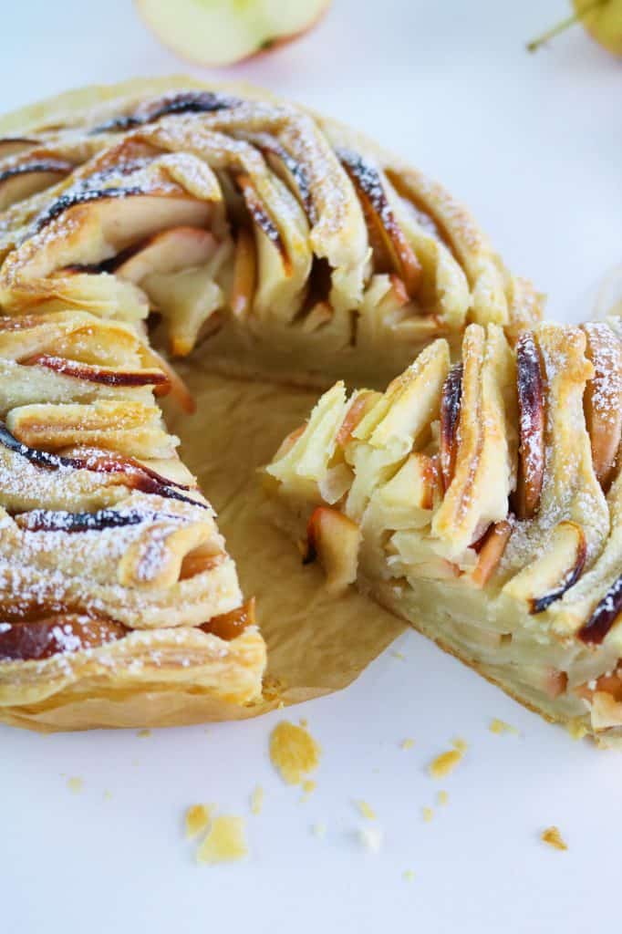 flaky apple tart close up to show layers of pastry and apple slices