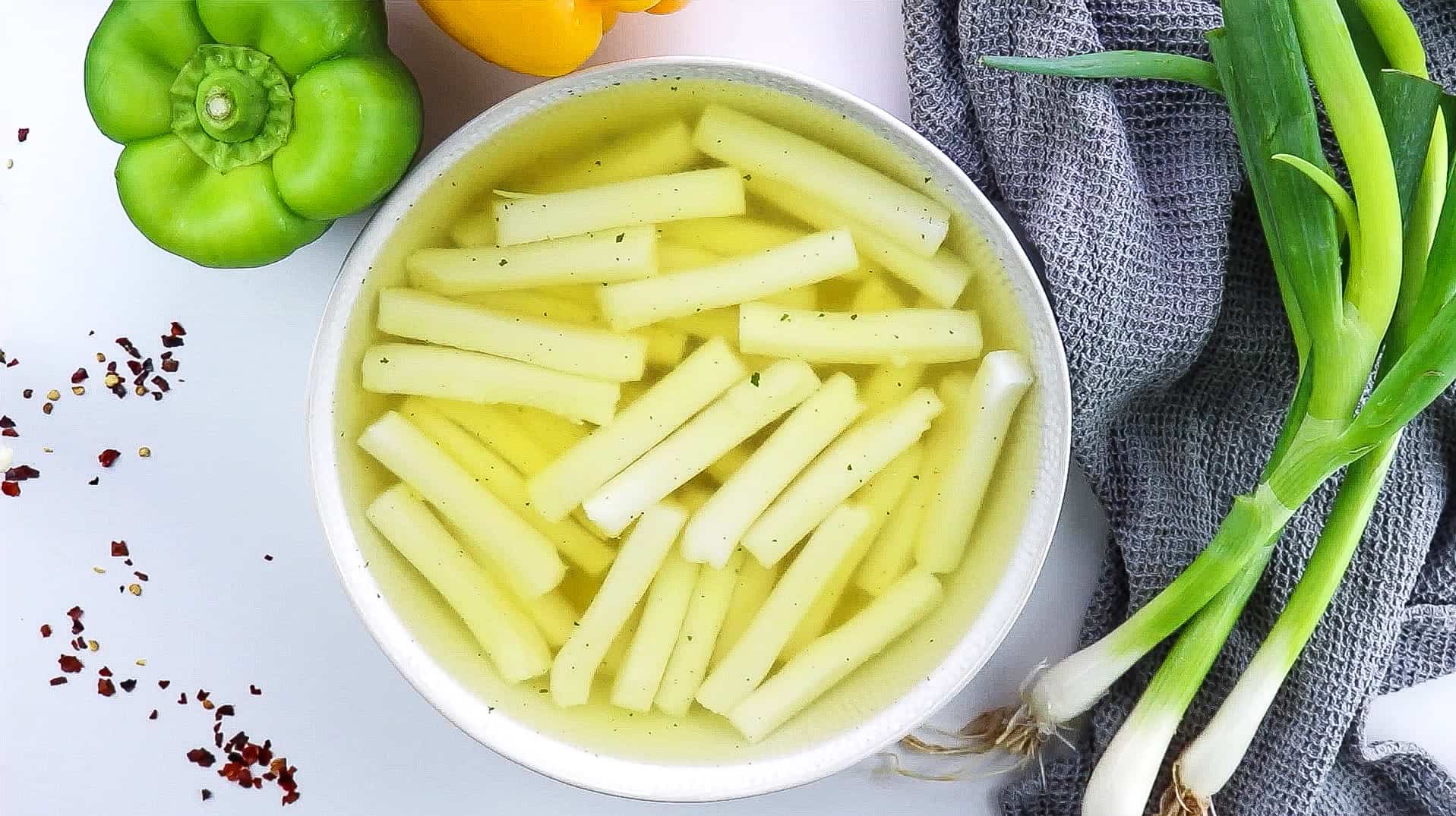 rice cakes soaking in hot vegetable broth