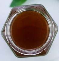 vegan fish sauce in an hexagonal glass jar