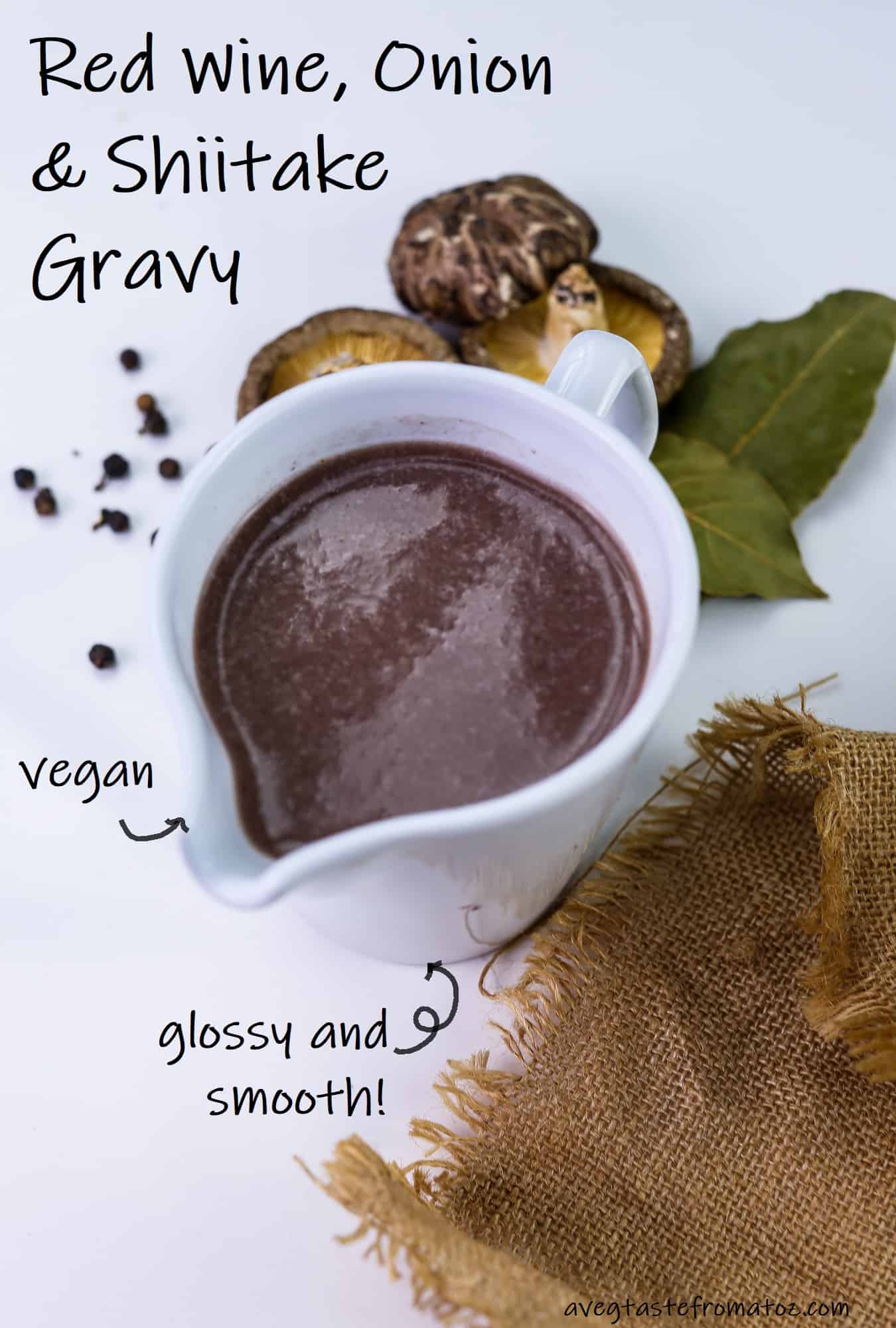 red wine, onion and shiitake mushrooms gravy in a white ceramic pot with black text