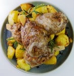 vegan chicken drumsticks on a plate with roasted potatoes