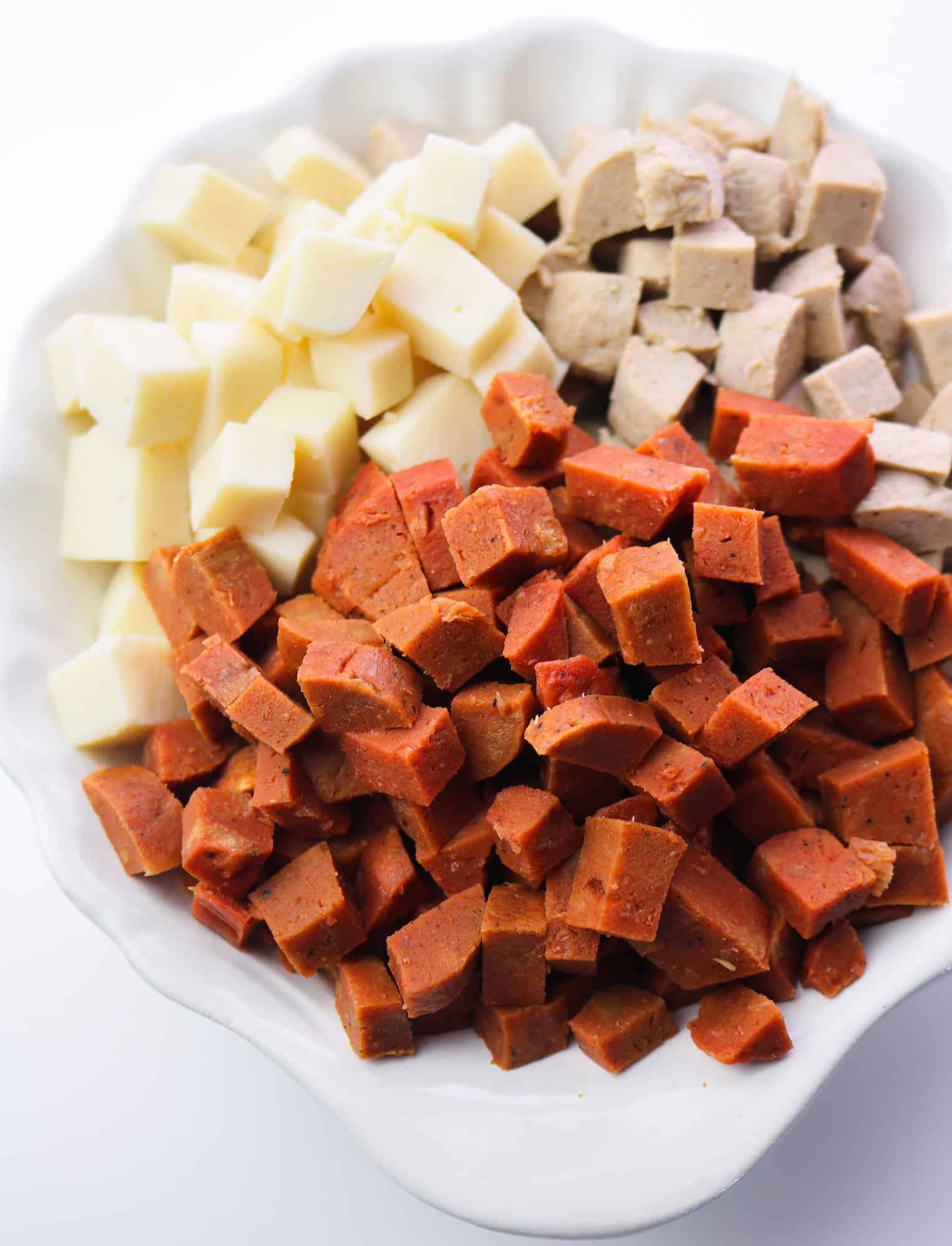 vegan meat and cheeses diced