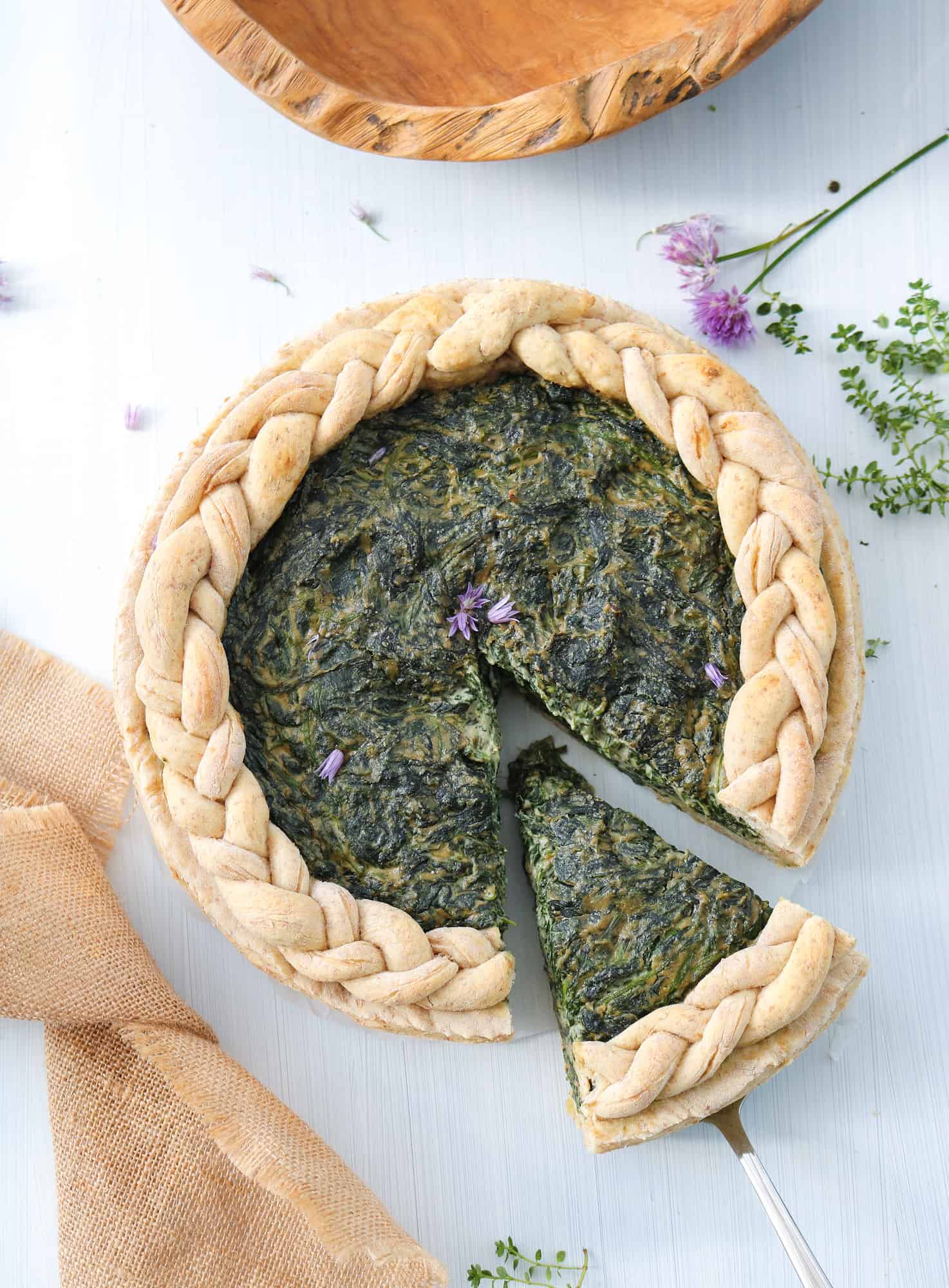vegan spinach pie with slice cut top down