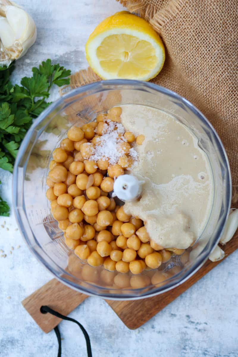 hummus ingredients in a blender, pre-blending