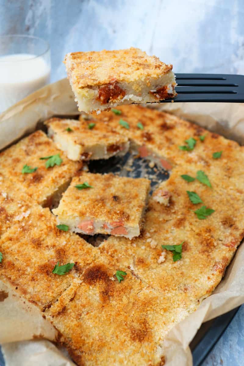 potato gateau close up on a square in a tray