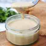 homemade tahini spoonful to show consistency