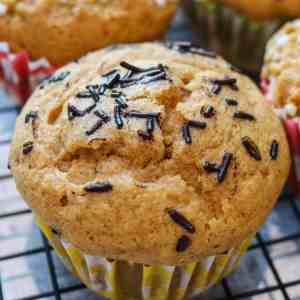 detail of pumpkin spice muffin topped with chocolate sprinkles