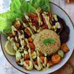 Vegan chickpea and rice bowl with tahini dressing