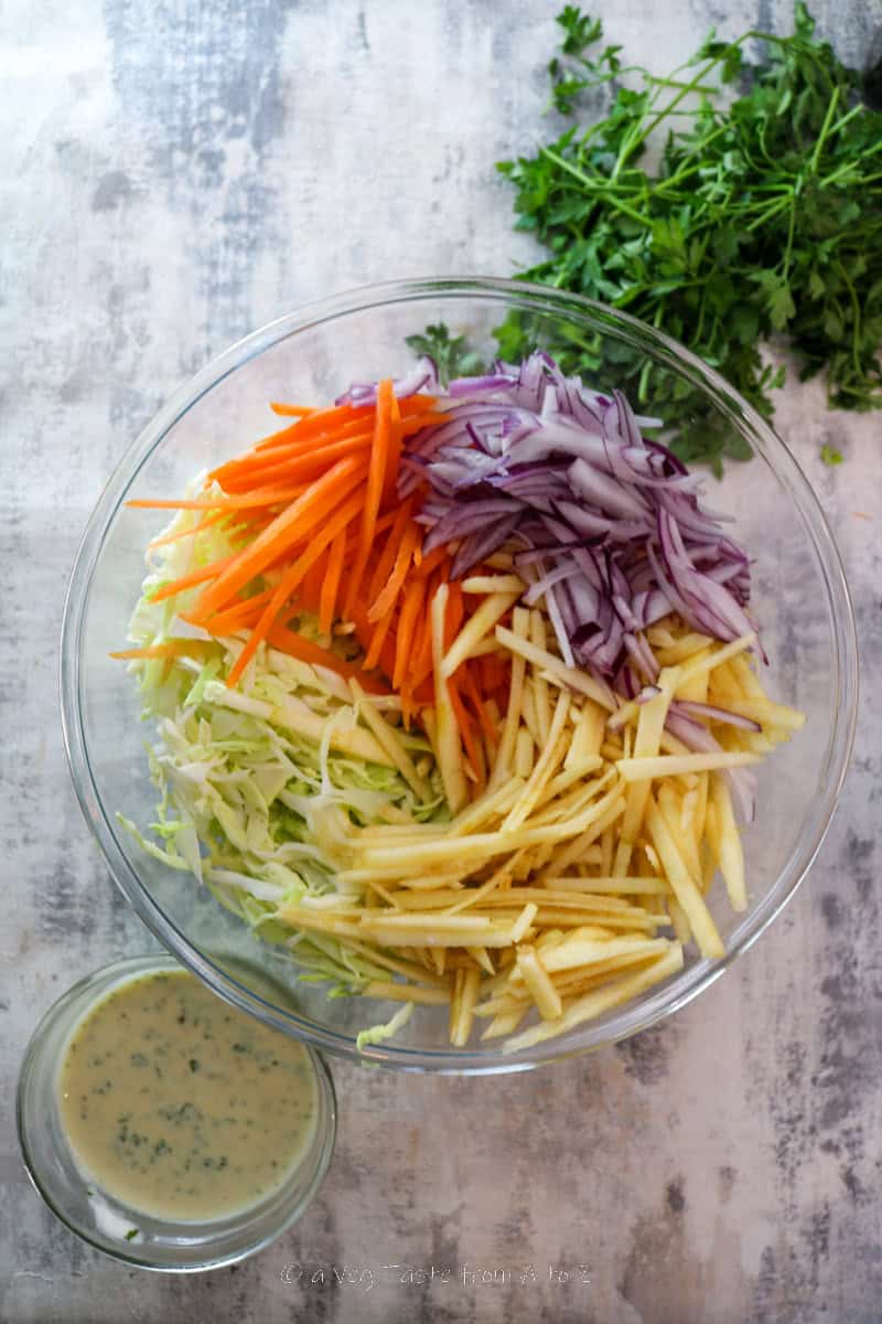 chopped ingredients for slaw in a mixing bowl