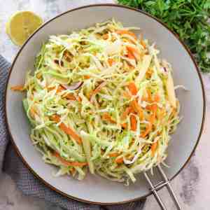 vibrant sweetheart cabbage slaw on serving plate